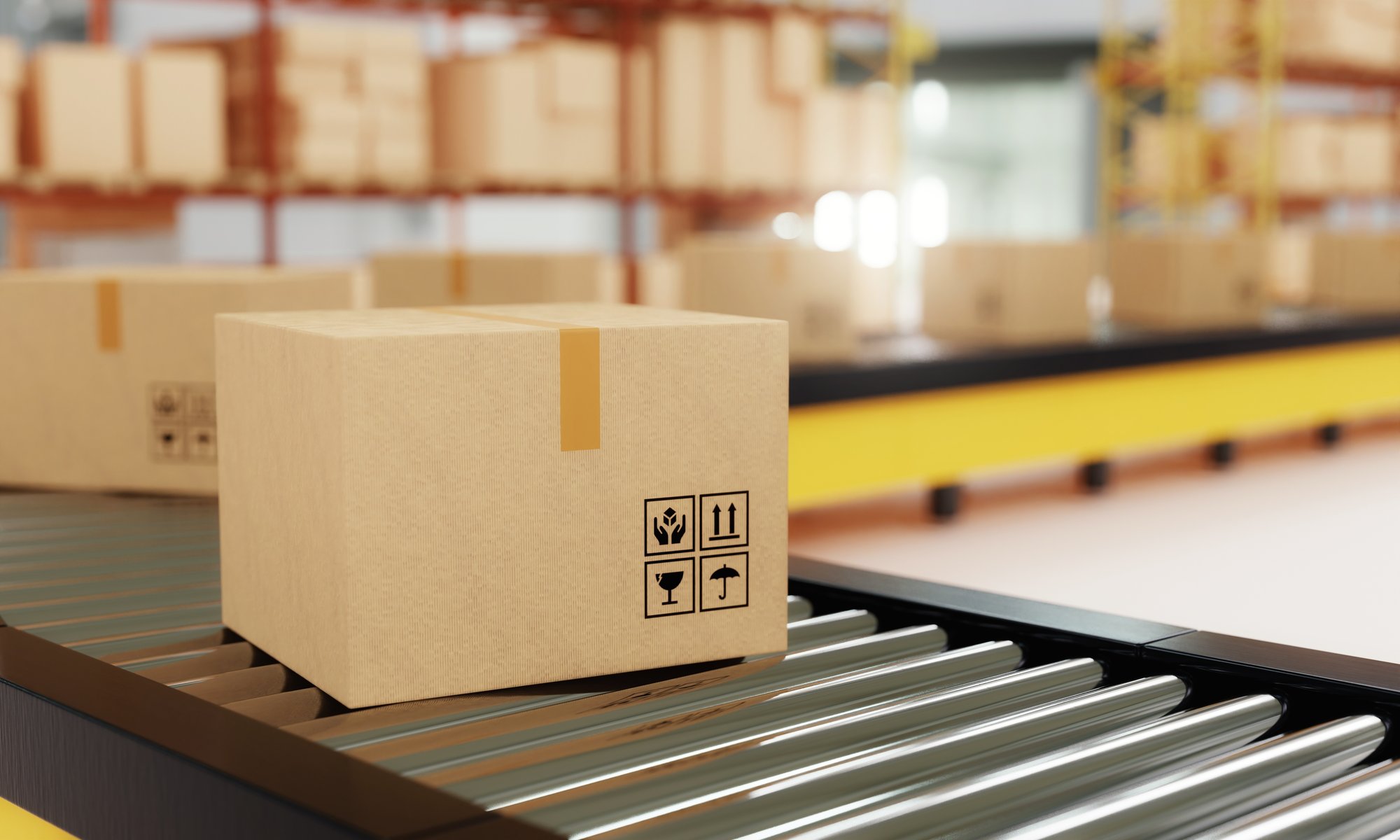 Cardboard box being packed on an assembly line.